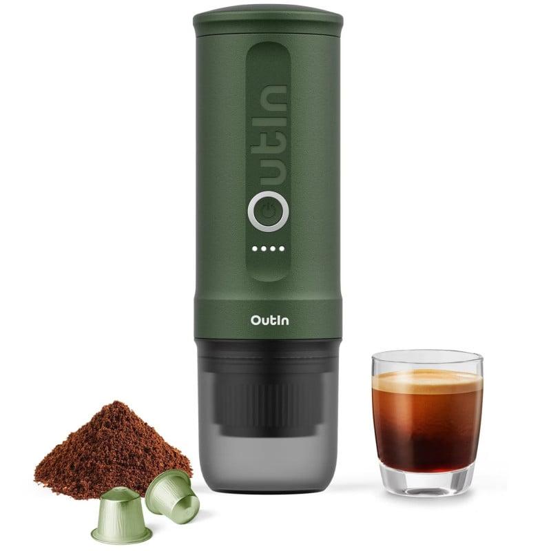 OutIn Nano portable espresso maker in forest green beside a glass of espresso, coffee pods and ground coffee